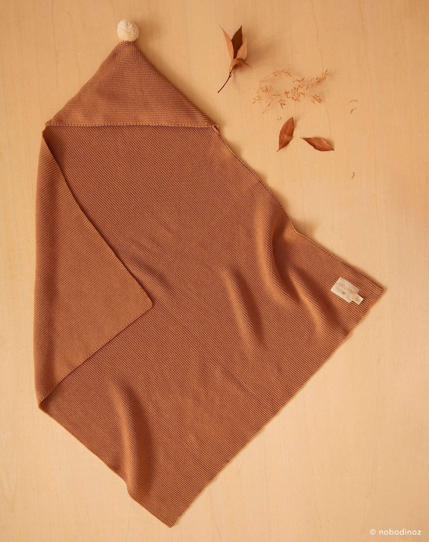 So natural knitted baby cape