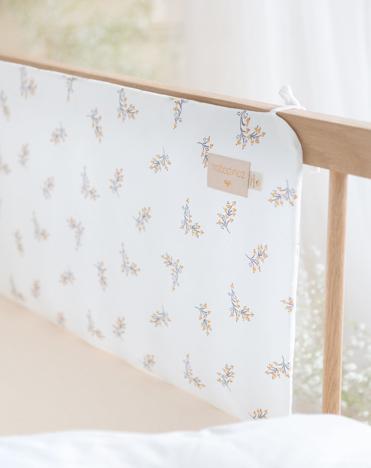 Protector de cuna Nest
