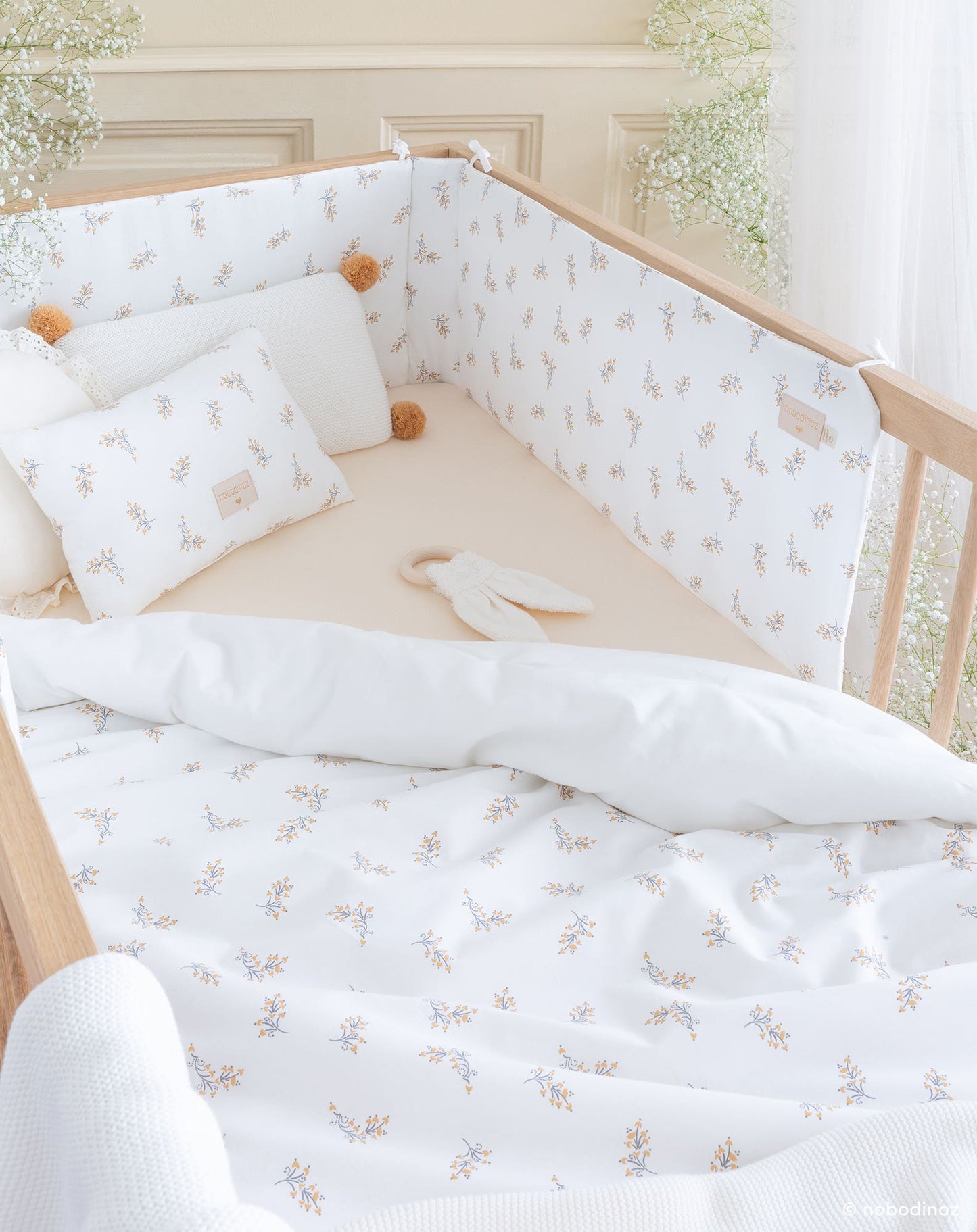 Protector de cuna Nest